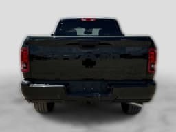 Ram 2500 Lone Star 4x4 Crew Cab 6'4" Box 2027 — side view