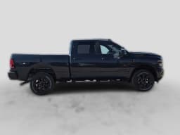 Ram 2500 Lone Star 4x4 Crew Cab 6'4" Box 2027 — side view