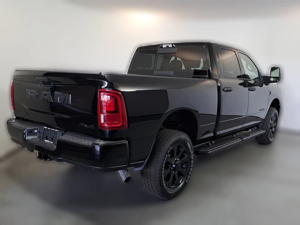 Ram 2500 Big Horn 4x4 Crew Cab 6'4" Box 2026 — side view