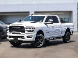 Ram 2500 Laramie 4x4 Crew Cab 6'4" Box 2026 — side view