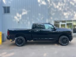 Ram 2500 Laramie 4x4 Crew Cab 6'4" Box 2026 — side view