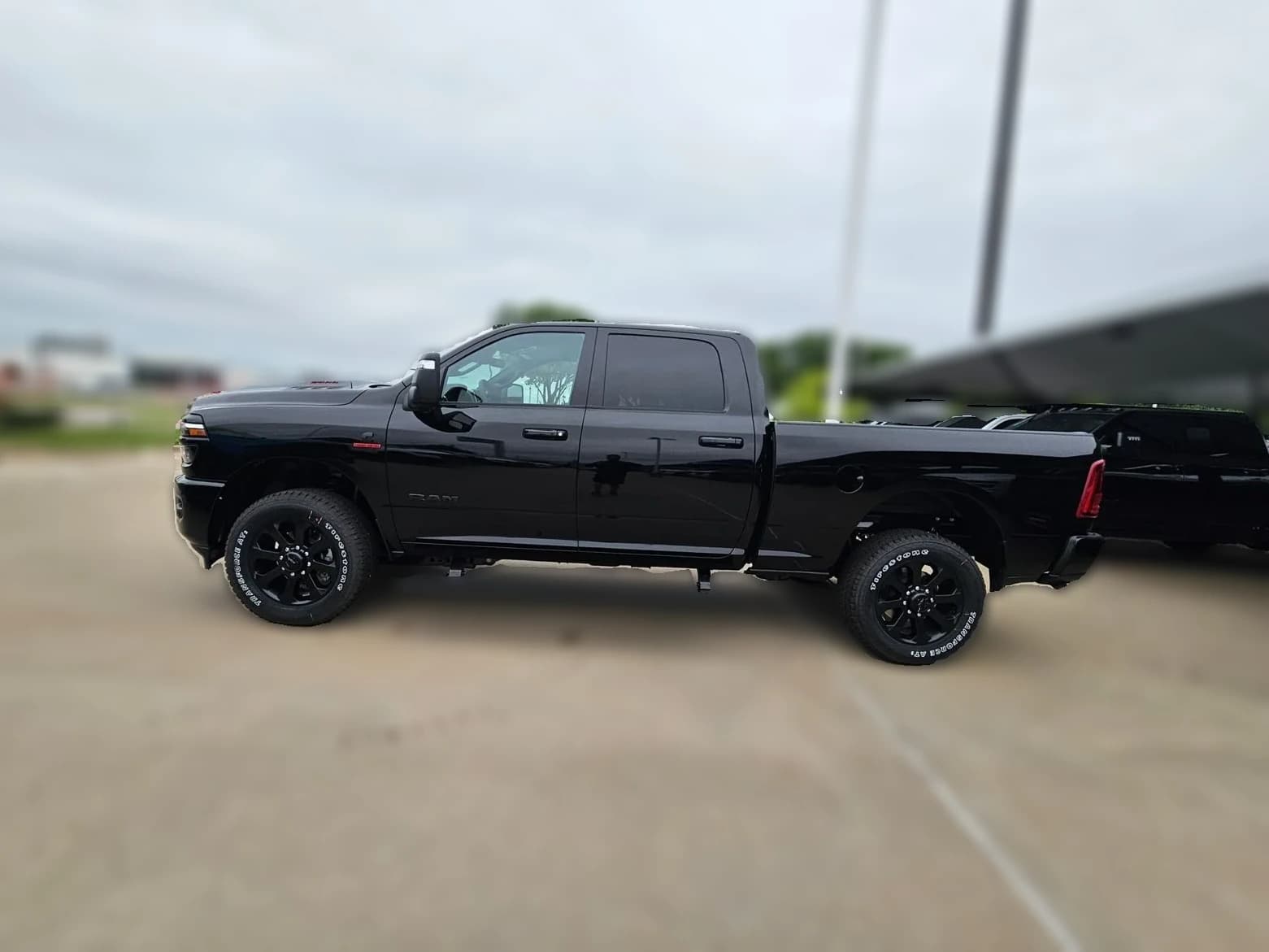 Ram 2500 Laramie 4x4 Crew Cab 6'4" Box 2026 — side view