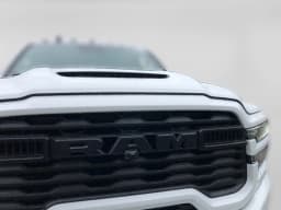 Ram 2500 Black Express 4x4 Crew Cab 8' Box 2027 — side view