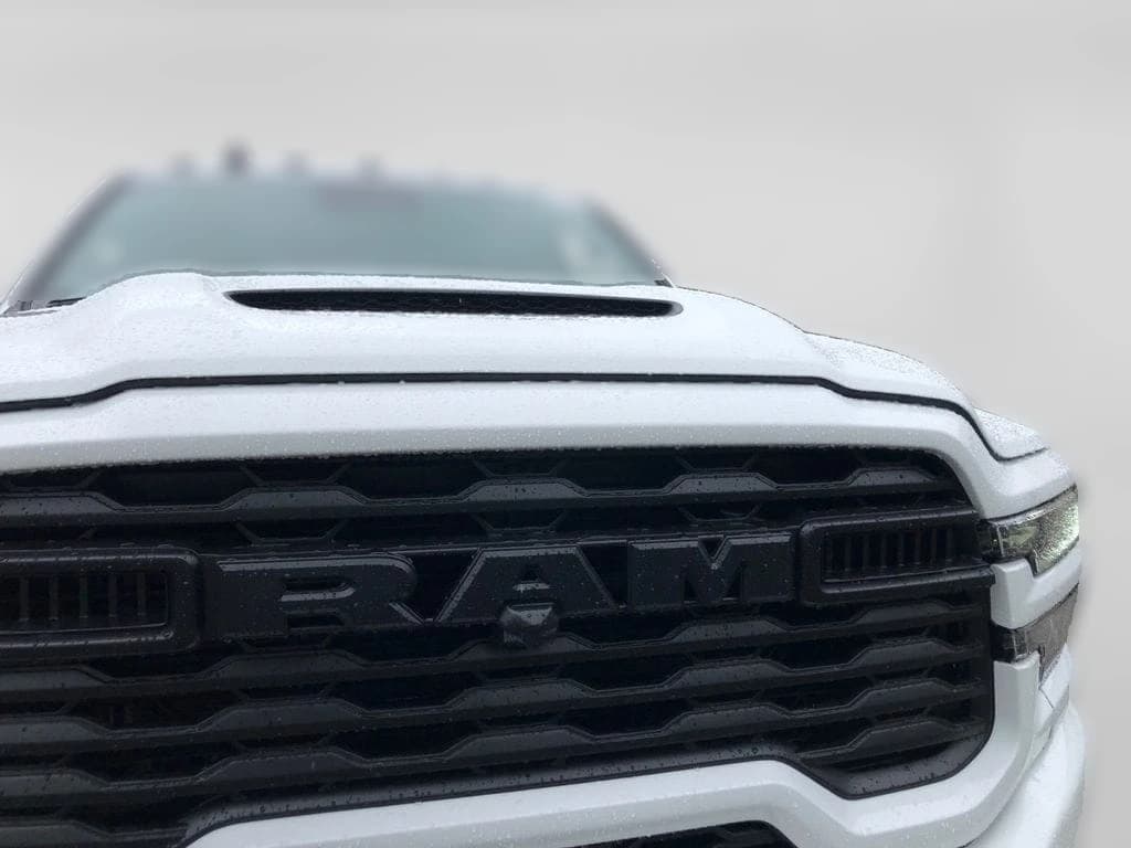 Ram 2500 Black Express 4x4 Crew Cab 8' Box 2027 — side view