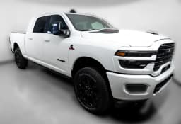 Ram 2500 Laramie 4x4 Mega Cab 6'4" Box 2027 — side view