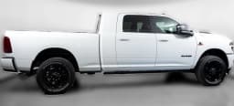 Ram 2500 Laramie 4x4 Mega Cab 6'4" Box 2027 — side view