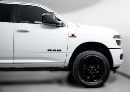 Ram 2500 Laramie 4x4 Mega Cab 6'4" Box 2027 — side view