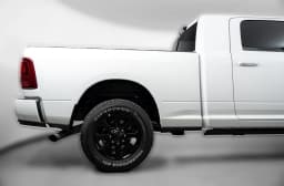 Ram 2500 Laramie 4x4 Mega Cab 6'4" Box 2027 — side view