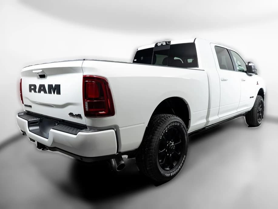Ram 2500 Laramie 4x4 Mega Cab 6'4" Box 2027 — side view