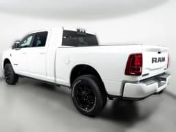 Ram 2500 Laramie 4x4 Mega Cab 6'4" Box 2027 — side view