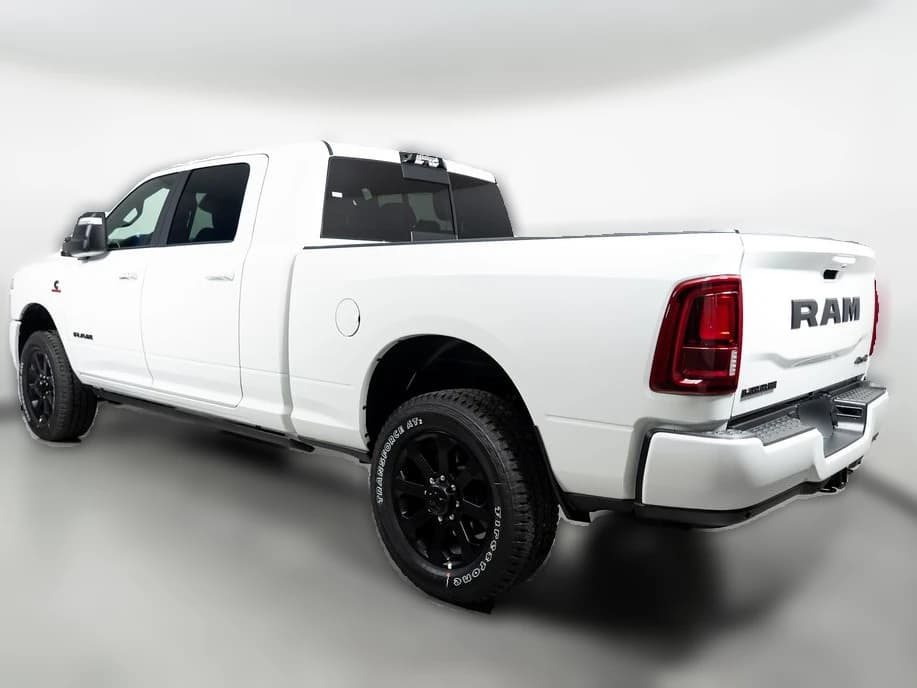 Ram 2500 Laramie 4x4 Mega Cab 6'4" Box 2027 — side view