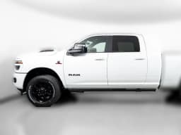 Ram 2500 Laramie 4x4 Mega Cab 6'4" Box 2027 — side view
