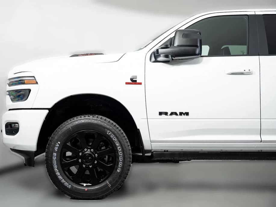 Ram 2500 Laramie 4x4 Mega Cab 6'4" Box 2027 — side view