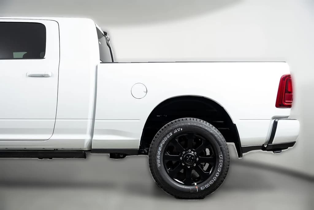 Ram 2500 Laramie 4x4 Mega Cab 6'4" Box 2027 — side view
