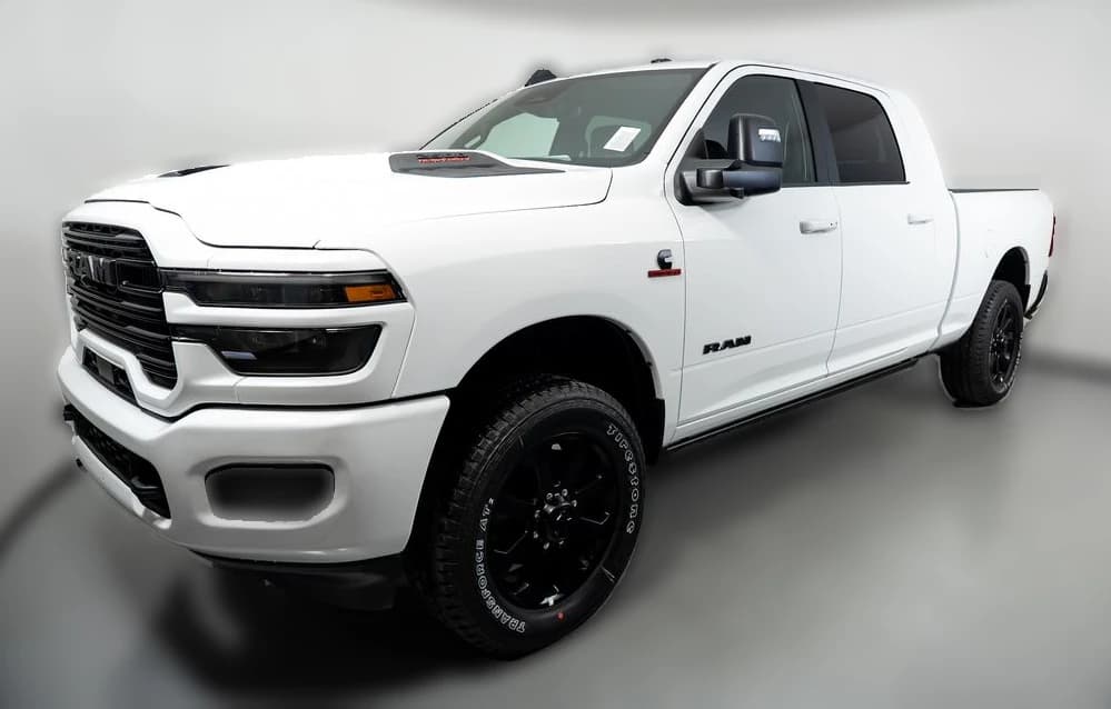 Ram 2500 Laramie 4x4 Mega Cab 6'4" Box 2027 — side view