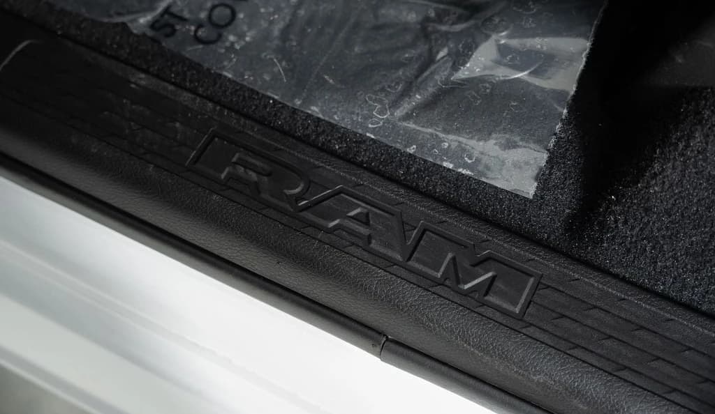 Ram 2500 Laramie 4x4 Mega Cab 6'4" Box 2027 — side view