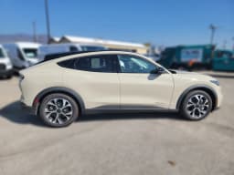 Ford Mustang Mach-E Select AWD 2025 — side view