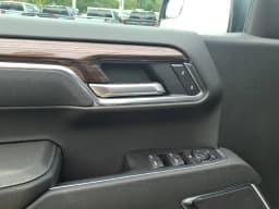Chevrolet Silverado 1500 LT 4WD Crew Cab 147" 2026 — side view