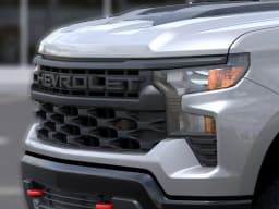 Chevrolet Silverado 1500 Custom Trail Boss 4WD Crew Cab 147" 2026 — side view