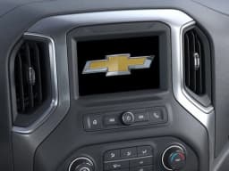 Chevrolet Silverado 1500 Custom Trail Boss 4WD Crew Cab 147" 2026 — side view