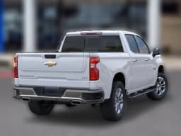 Chevrolet Silverado 1500 LTZ 4WD Crew Cab 147" 2026 — side view