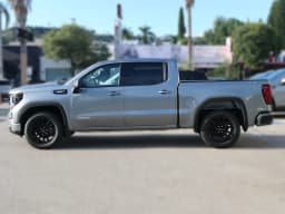 GMC Sierra 1500 Elevation 4WD Crew Cab 147" 2026 — side view