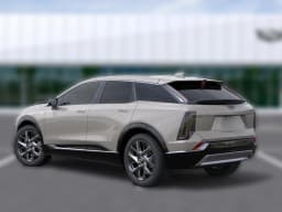 Cadillac OPTIQ Luxury 4dr 2027 — side view