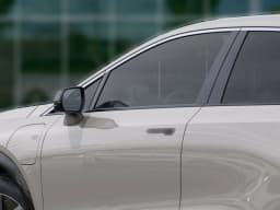 Cadillac OPTIQ Luxury 4dr 2027 — side view