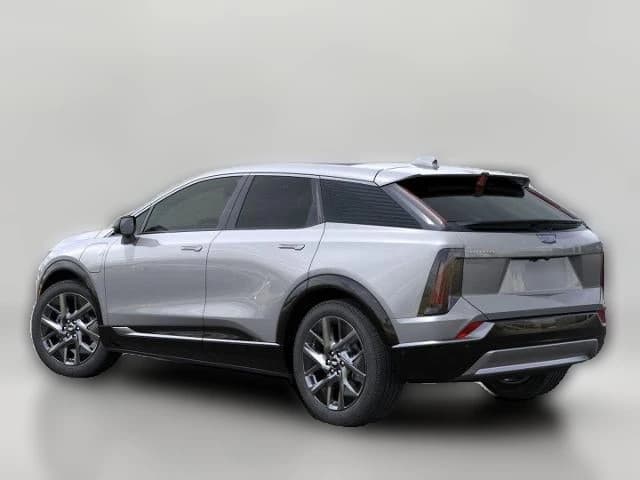 Cadillac OPTIQ Luxury 4dr 2027 — side view