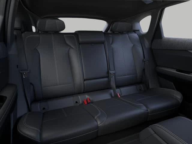 Cadillac OPTIQ Luxury 4dr 2027 — side view