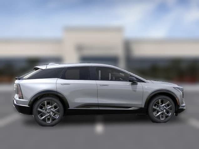 Cadillac OPTIQ Luxury 4dr 2027 — side view