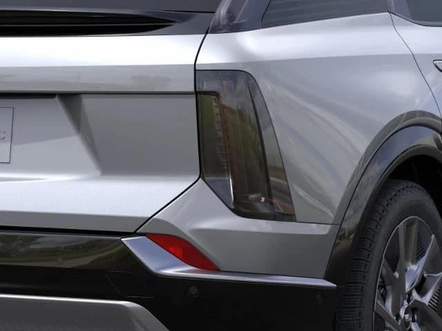 Cadillac OPTIQ Luxury 4dr 2027 — side view