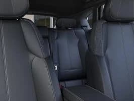 Cadillac OPTIQ Luxury 4dr 2027 — side view