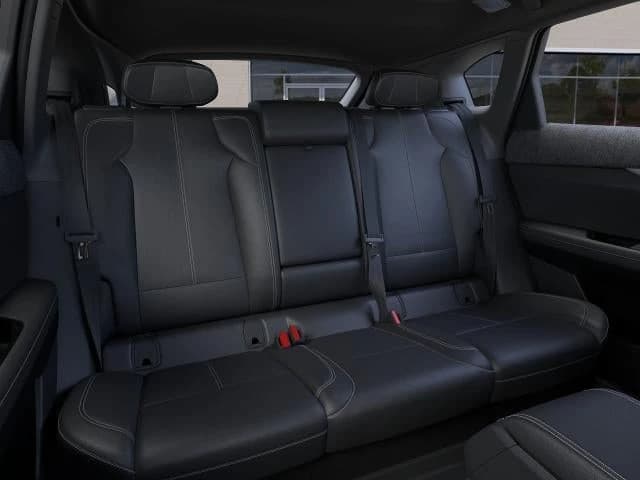 Cadillac OPTIQ Luxury 4dr 2027 — side view