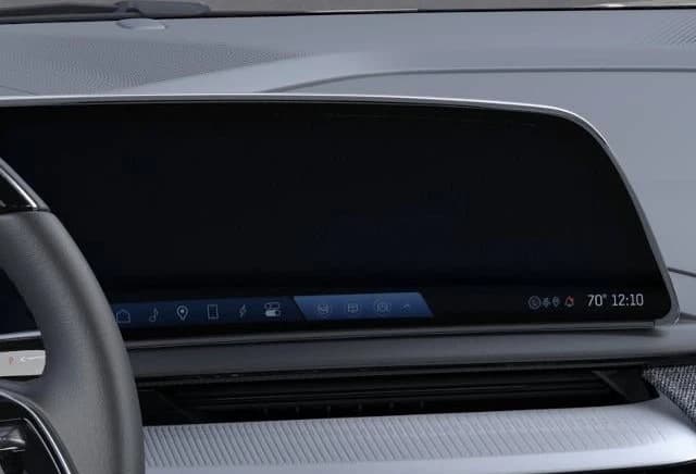 Cadillac OPTIQ Luxury 4dr 2027 — side view