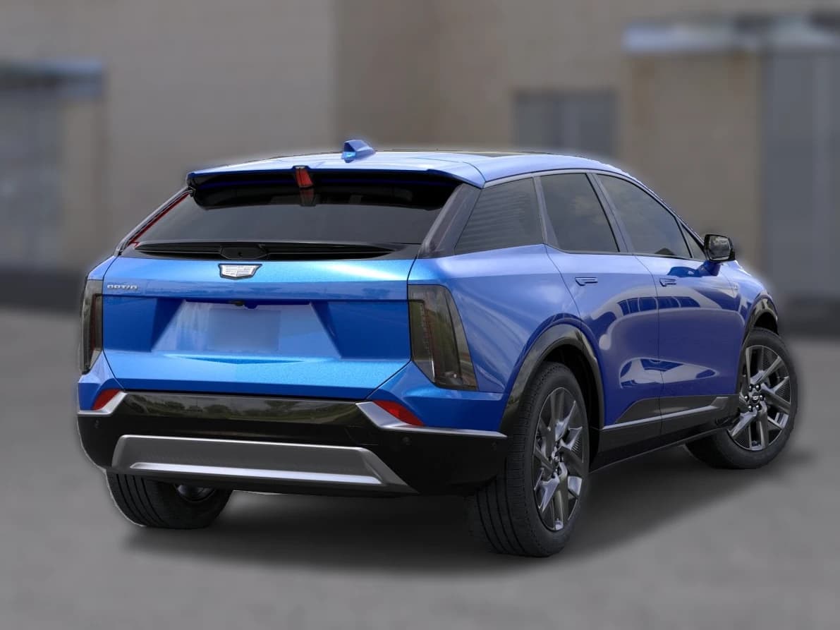 Cadillac OPTIQ Luxury 4dr 2027 — side view