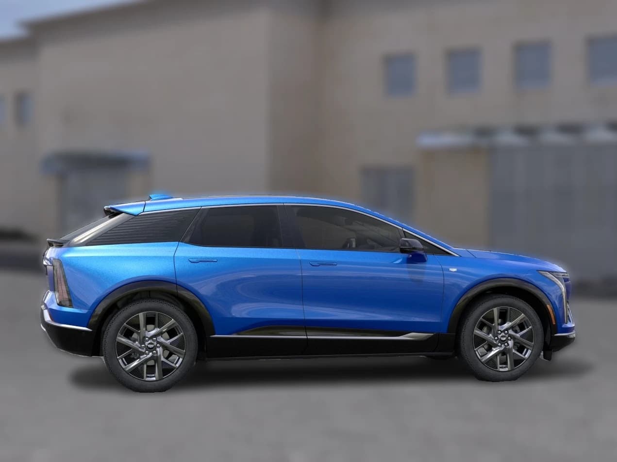 Cadillac OPTIQ Luxury 4dr 2027 — side view