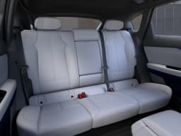 Cadillac OPTIQ Luxury 4dr 2027 — side view