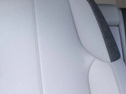 Cadillac OPTIQ Luxury 4dr 2027 — side view