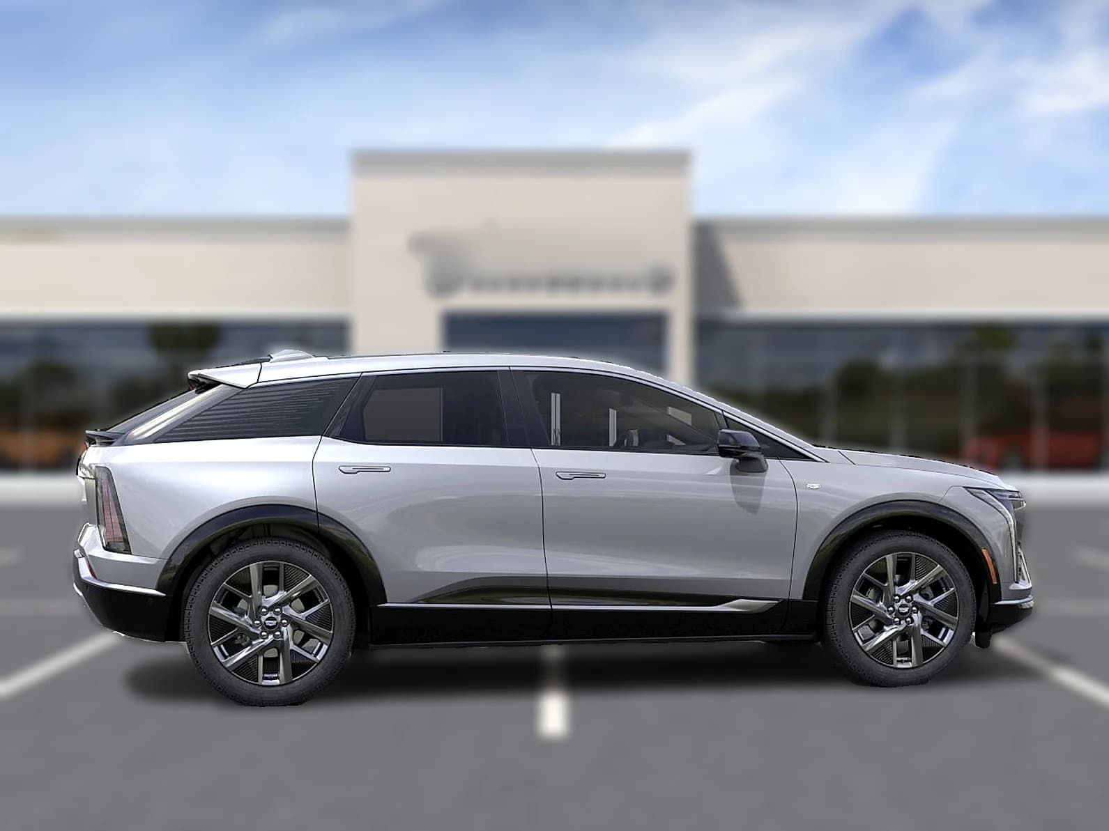 Cadillac OPTIQ Luxury 4dr 2027 — side view