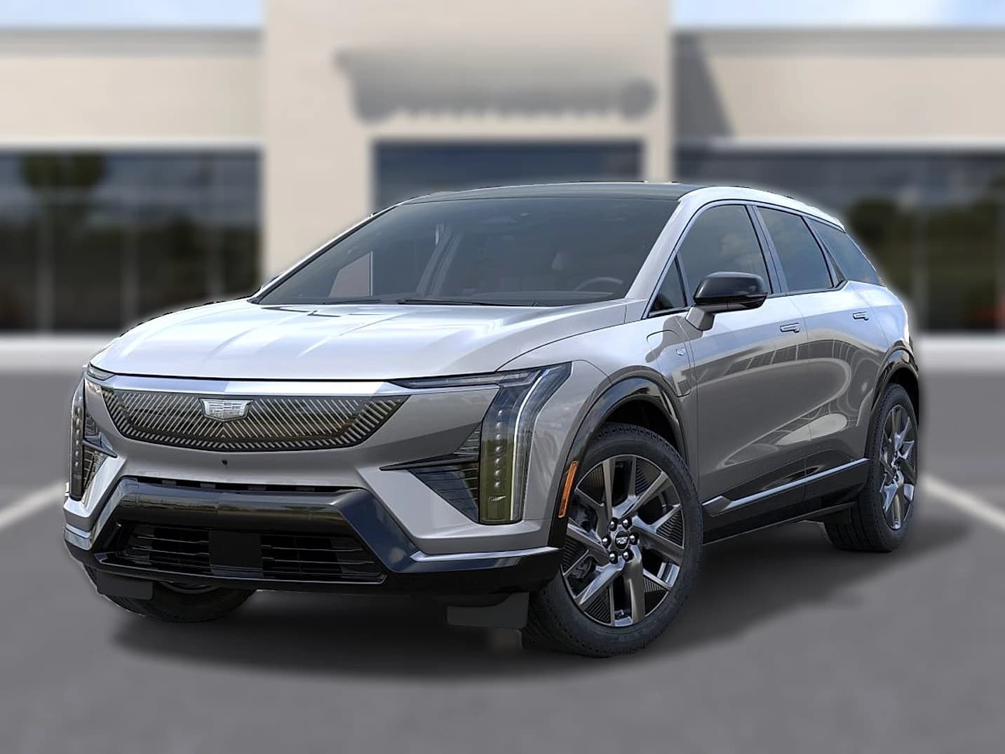 Cadillac OPTIQ Luxury 4dr 2027 — side view