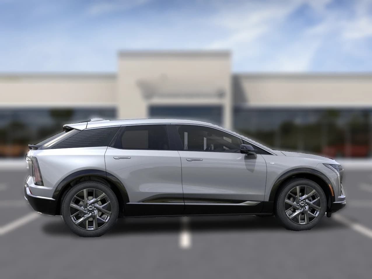 Cadillac OPTIQ Luxury 4dr 2027 — side view