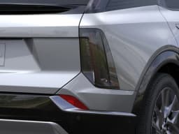 Cadillac OPTIQ Luxury 4dr 2027 — side view