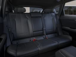 Cadillac OPTIQ Luxury 4dr 2027 — side view