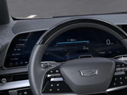 Cadillac OPTIQ Luxury 4dr 2027 — side view