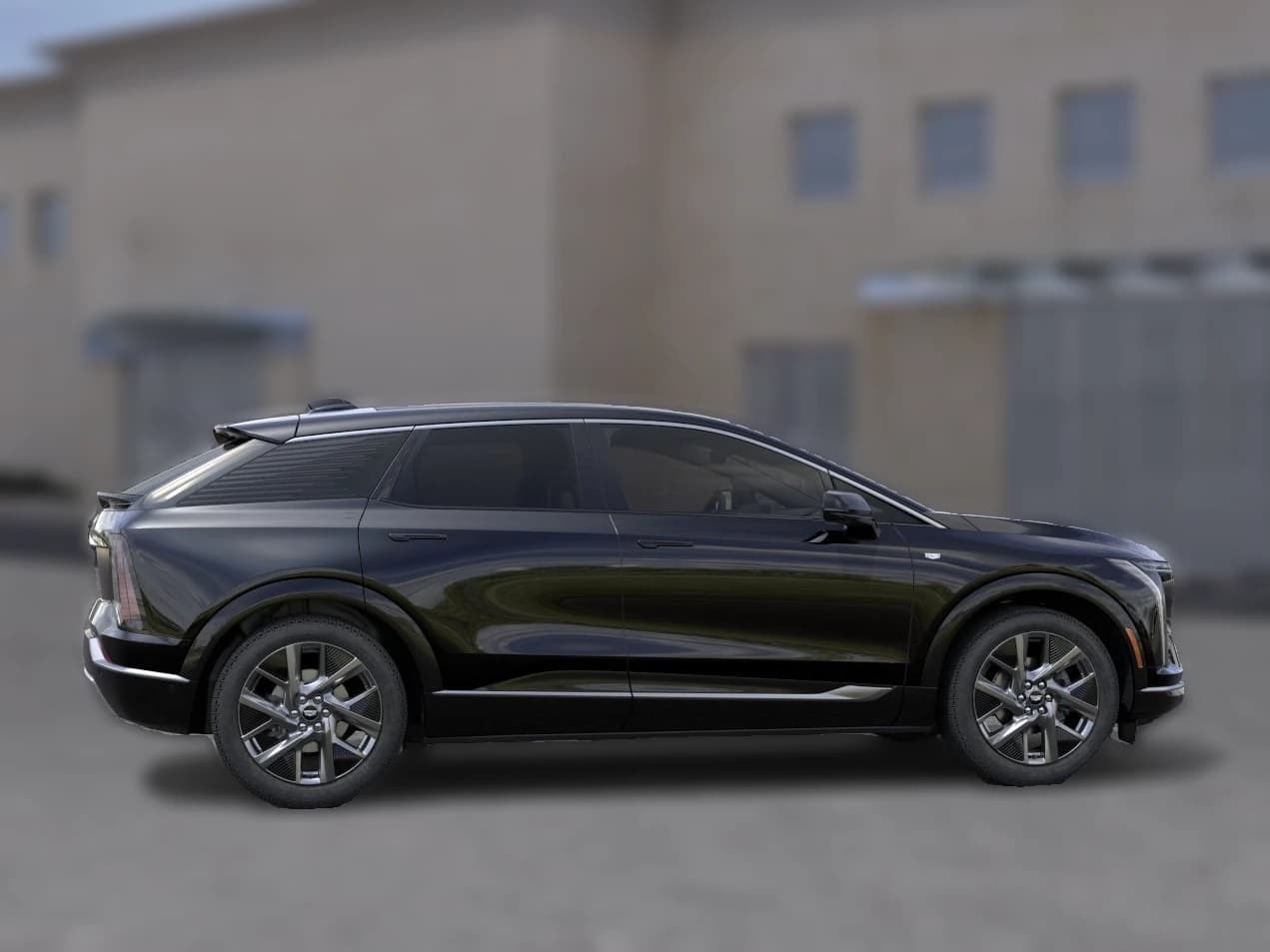 Cadillac OPTIQ Luxury 4dr 2027 — side view