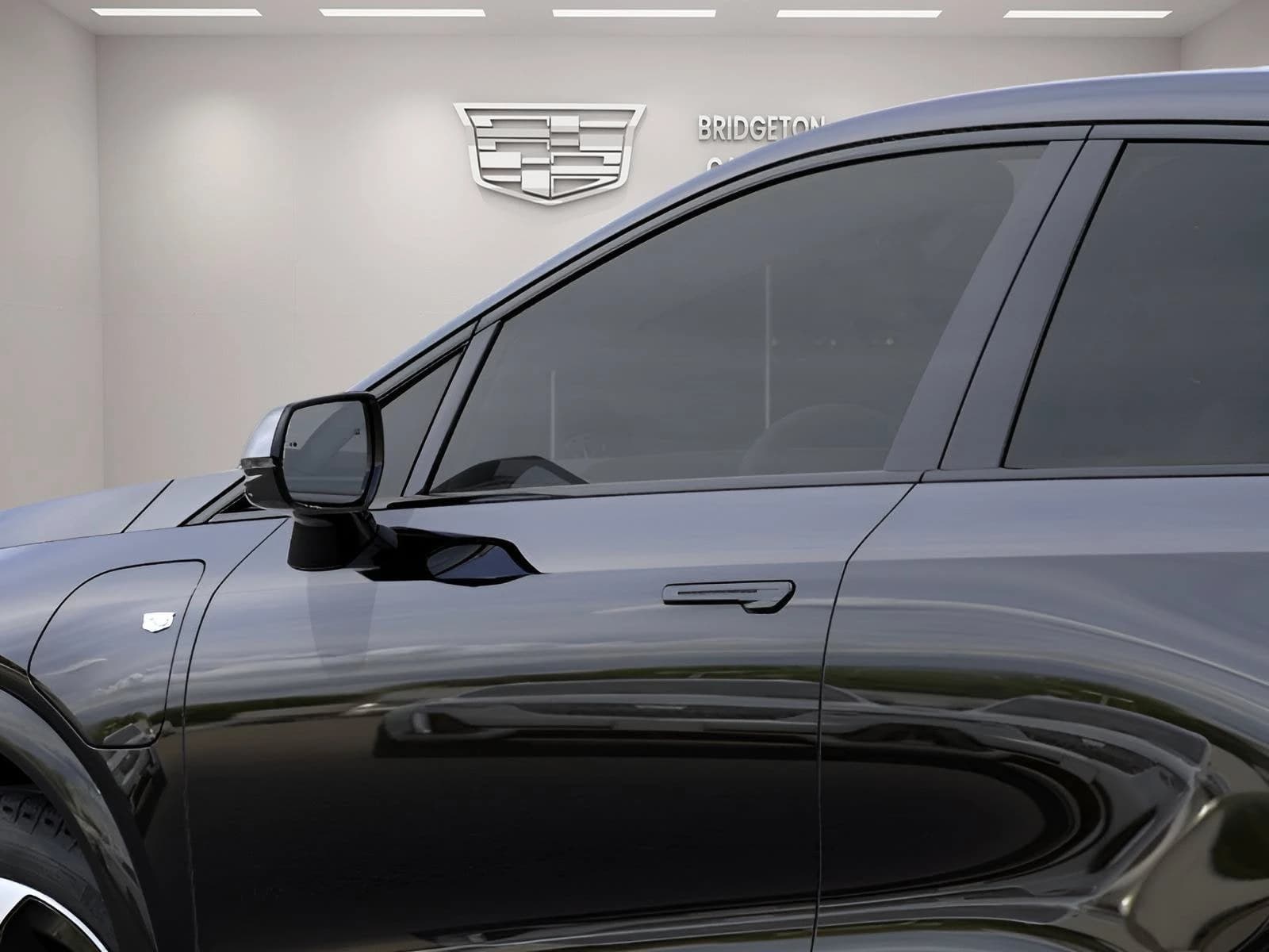 Cadillac OPTIQ Sport 4dr w/1SF 2026 — side view
