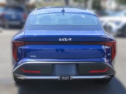 Kia K4 LXS Sedan 2026 — side view