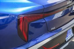 Kia K4 LXS Sedan 2026 — side view