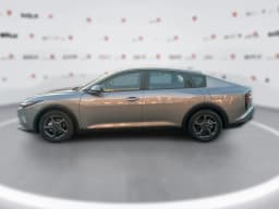 Kia K4 LXS Sedan 2026 — side view